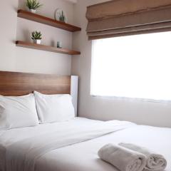 Comfy 2BR Apartment at Grand Asia Afrika By Travelio