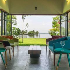 Cheppanam House with Backwater View and Pvt Lawn by StayVista