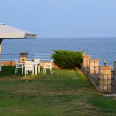 Alexandros Apartments , Beachfront Retreat near Petalidi with Private Sunbeds & Sea View