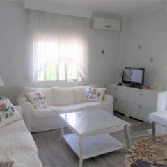 Pefkohori apart. near the beach with indor parking and yard
