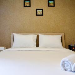 Minimalist and Comfy 1BR Grand Kamala Lagoon Apartment By Travelio