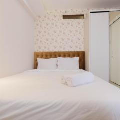 Cozy and Elegant 2BR Bassura City Apartment By Travelio