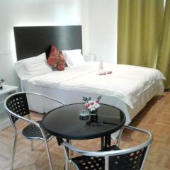 Studio at Grand Baie 200 m away from the beach with shared pool furnished balcony and wifi