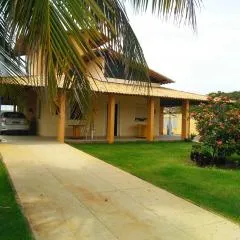 Casa de praia condomínio fechado, frente para o mar