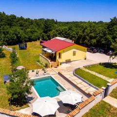 Sunny yellow house with a pool