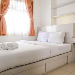 Warm and Cozy 2BR Green Pramuka Apartment near Mall By Travelio