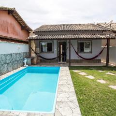 Casa com piscina, wifi e churrasqueira em unamar.