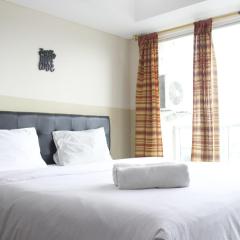 Modern Studio Room at Tamansari La Grande Apartment By Travelio