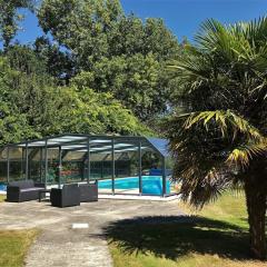 Villa de plain-pied avec WIFI, piscine privée sous abris haut à PLEUMEUR-BODOU - Ref 461