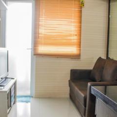 Minimalist 2BR Green Pramuka City Apartment near Shopping Mall By Travelio