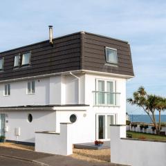 Deluxe Modern House with Sea views and beach 300 footsteps away