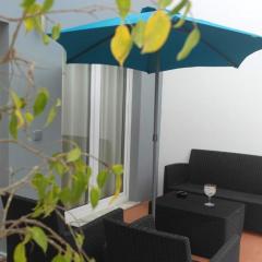 One bedroom house with shared pool enclosed garden and wifi at Atalaia 3 km away from the beach