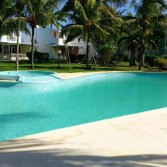 3 bedrooms house with shared pool enclosed garden and wifi at Trou aux Biches