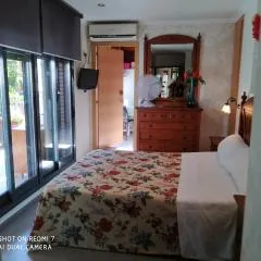 Habitacion Familiar en un Ático con gran terraza y,cocina ,en la playa