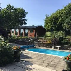 Tudor Lodge with pool & BBQ cabin