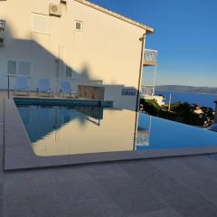 Apartment 1 with pool and amazing sea view