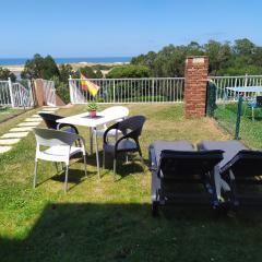 Apartamento con jardin privado junto playa Usil - Mogro