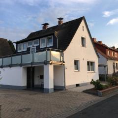 Ferienwohnung „Im Kleinen Löök“ - DG - 2 Zimmer - Balkon - Boxspringbett - 2 TV