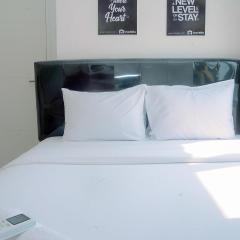 2BR Fully Furnished Minimalist Bassura City Apartment By Travelio