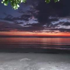 Bella's Beach Resort 2-bedroom Cottage 1 large bedroom with aircon and 1 small maids type room with fan