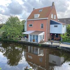 Characteristic detached house next to water