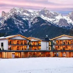 Wellness und Brunch Hotel MorgenZeit beheizter Naturpool mit Sandstrand Genuss Frühstück bis 13 Uhr Hochkönig Sommercard