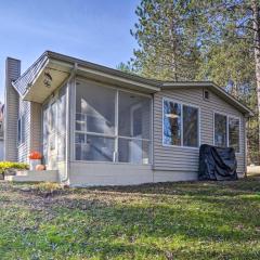 Riverfront Grayling Retreat with Fire Pit and Dock!