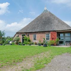 Characteristic head neckhull farm with rowing boat