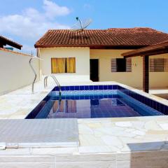 Casa com piscina no litoral norte