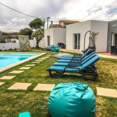4 bedrooms house with shared pool enclosed garden and wifi at Atalaia 3 km away from the beach