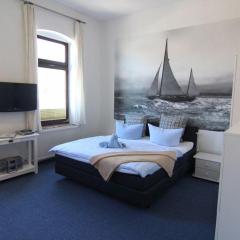 Kapitaenshaus-Lassen-Zimmer-Neptun