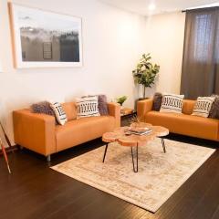 Airy & Tidy 2BR Apt with Free Covered Garage Parking - Central Modern