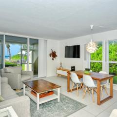 LaPlaya 101A Step out to the beach from your screened lanai Light and bright end unit