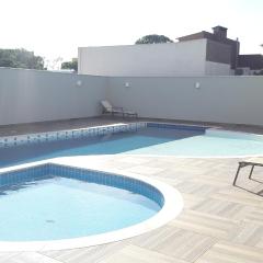 Florianópolis Canasvieiras Apartamento inteiro 3 quartos com ar piscina playground 2 garagens