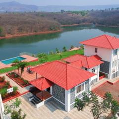 Casa Paun by StayVista - A lake-view villa with Infinity pool, Modern interiors & an amphitheatre