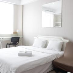 Bright Studio Room at Dago Suites Apartment near ITB By Travelio