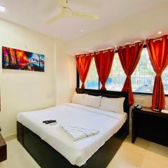 Deluxe Inn - Stay Near Kokilaben Dhirubhai Ambani Hospital