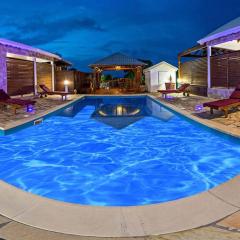 Maison accueillante avec piscine partagée à Anse-Bertrand