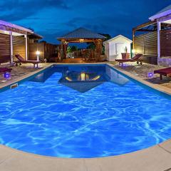 Maison d'une chambre avec piscine partagee jacuzzi et jardin clos a Anse Bertrand