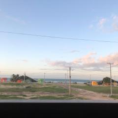 Casa na praia com vista para o mar