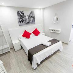 Roses Apartments Red Loft vista mar lateral