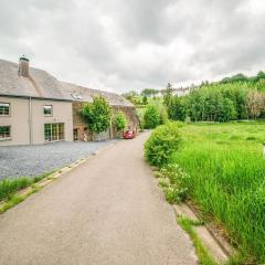 Beautiful home in L glise with a garden and pond