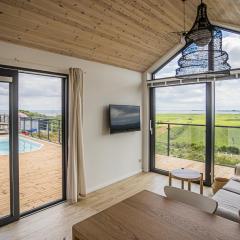 Nowe Domki Deluxe z widokiem na zatokę z basenem i sauną