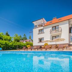 Bryza Jantar apartamenty z sauną & domki z kominkami