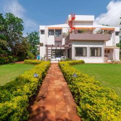 StayVista's Fairfield Villa - A green lawn and charming orchard await your retreat