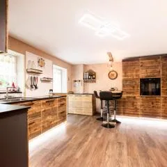 Sa Mont Home - Moderno appartamento con parcheggio, sauna e deposito sci