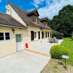 House in a green setting with swimming pool