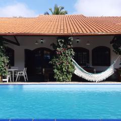 PROMO Casa confortável 100mts da Praia com Piscina, Churrasqueira e Sinuca no Cond Costa Norte