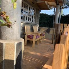 Enchanting Pallet-Themed Olugulu Cottage