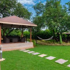Classique Woods by StayVista with Lawn with Gazebo & Bar, Indoor Fun